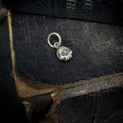 Dainty Death Charm | Skull Charm in Sterling Silver - Uneven X Olivia Faust